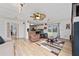 Spacious living room with comfy furniture and view to backyard at 875 Eden Dr, St Cloud, FL 34771
