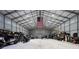 Large workshop with American flag and various storage at 875 Eden Dr, St Cloud, FL 34771