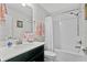 Bathroom with a single vanity, tub and shower at 8870 Backspin Ln, Champions Gate, FL 33896