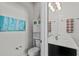 Small bathroom with toilet and vanity at 8870 Backspin Ln, Champions Gate, FL 33896