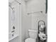 Clean bathroom featuring a bathtub, toilet and shower at 8870 Backspin Ln, Champions Gate, FL 33896