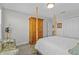Bedroom with a wooden wardrobe and a comfortable bed at 8870 Backspin Ln, Champions Gate, FL 33896