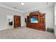 Bonus room with built-in entertainment center and views into other rooms at 8870 Backspin Ln, Champions Gate, FL 33896