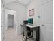 Convenient laundry room with washer, dryer, and desk at 8870 Backspin Ln, Champions Gate, FL 33896