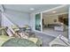 Bright screened porch with access to the living room at 8870 Backspin Ln, Champions Gate, FL 33896