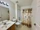 Second bathroom with shower/tub combo and single vanity at 4006 San Gallo Dr # 108, Kissimmee, FL 34741