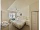Bright bedroom with a double bed, white furniture, and large window at 4006 San Gallo Dr # 108, Kissimmee, FL 34741
