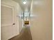Hallway with carpet and access to bathroom at 4006 San Gallo Dr # 108, Kissimmee, FL 34741