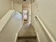 Upstairs hallway with carpeted flooring and access to bedrooms at 4006 San Gallo Dr # 108, Kissimmee, FL 34741