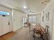 Combined living and dining area with light carpet and white furniture at 4006 San Gallo Dr # 108, Kissimmee, FL 34741