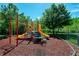 playground with slides, climbing structures, and safety surfacing at 4006 San Gallo Dr # 108, Kissimmee, FL 34741