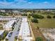 Aerial view of townhouses and surrounding landscape at 7537 Brooklyn Dr, Kissimmee, FL 34747