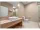 Clean bathroom with a modern vanity, toilet, and a large walk-in shower at 7537 Brooklyn Dr, Kissimmee, FL 34747