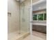 Modern bathroom with a walk-in shower and stylish tile work at 7537 Brooklyn Dr, Kissimmee, FL 34747