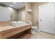 Clean and modern bathroom with a white vanity and tile shower at 7537 Brooklyn Dr, Kissimmee, FL 34747