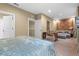 Spacious bedroom with sitting area and ensuite bathroom at 7537 Brooklyn Dr, Kissimmee, FL 34747