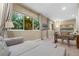 Bedroom with a sleeper sofa, large window, and adjacent workspace at 7537 Brooklyn Dr, Kissimmee, FL 34747