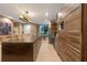 Modern kitchen with wood cabinets and island at 7537 Brooklyn Dr, Kissimmee, FL 34747