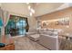 Open living area with sectional sofa and patio access at 7537 Brooklyn Dr, Kissimmee, FL 34747