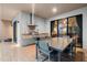 Outdoor kitchen and dining area with built-in grill at 7537 Brooklyn Dr, Kissimmee, FL 34747