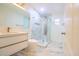 This contemporary bathroom boasts a glass shower, sleek vanity, and tile flooring at 10001 Newington Dr, Orlando, FL 32836