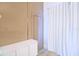 Neutral bedroom offers modern cabinet and unique privacy door to adjoining room at 10001 Newington Dr, Orlando, FL 32836