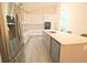 Spacious kitchen with stainless appliances, island with seating, and modern finishes at 10001 Newington Dr, Orlando, FL 32836