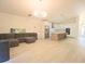 Bright and airy living room with hardwood floors and large windows at 10001 Newington Dr, Orlando, FL 32836