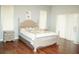 Spacious bedroom with wood floors and a large window at 1028 Merrimack Blvd, Davenport, FL 33837