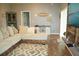 Spacious living room with sectional sofa and wood-look wall at 1028 Merrimack Blvd, Davenport, FL 33837