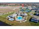 Aerial view of community pool and tennis courts at 10425 Folly Beach Rd, Orlando, FL 32827