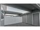 Private backyard with paver patio and gray siding at 10425 Folly Beach Rd, Orlando, FL 32827