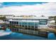 Canvas waterfront restaurant with large windows and patio seating at 10425 Folly Beach Rd, Orlando, FL 32827
