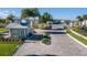 Gated community entrance with landscaping and guardhouse at 10425 Folly Beach Rd, Orlando, FL 32827