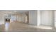 Open concept main living area features kitchen island and tile flooring at 10425 Folly Beach Rd, Orlando, FL 32827