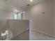 Upstairs hallway with access to bedrooms and bathroom at 10425 Folly Beach Rd, Orlando, FL 32827