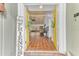 Inviting entryway with yellow doors leading to a spacious living area at 109 Arrowhead Ln, Haines City, FL 33844