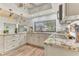 Modern kitchen with granite countertops and stainless steel appliances at 109 Arrowhead Ln, Haines City, FL 33844