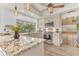 Updated kitchen featuring granite countertops and stainless steel appliances at 109 Arrowhead Ln, Haines City, FL 33844