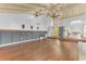 High-ceilinged living room with hardwood floors and fireplace at 109 Arrowhead Ln, Haines City, FL 33844
