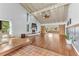 Spacious living room with hardwood floors, fireplace, and high ceilings at 109 Arrowhead Ln, Haines City, FL 33844