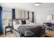 Spacious bedroom with king-size bed and ensuite desk at 1138 Kingsbarn St, Davenport, FL 33896