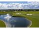 Aerial view of a beautiful golf course at 1138 Kingsbarn St, Davenport, FL 33896