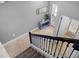 Staircase leading to upper level with simple design at 1138 Kingsbarn St, Davenport, FL 33896