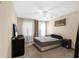 Comfortable bedroom with carpeted floor and ceiling fan at 12311 Lantana Park Ln # 108, Orlando, FL 32837