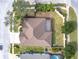 Aerial view of house and surrounding landscape at 125 Viola Dr, Auburndale, FL 33823