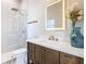 Clean bathroom with a frameless glass shower, and a modern vanity at 125 Viola Dr, Auburndale, FL 33823