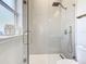 Bathroom with a large glass shower and modern fixtures at 125 Viola Dr, Auburndale, FL 33823