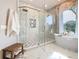 Stunning bathroom with a large shower, freestanding tub and marble details at 125 Viola Dr, Auburndale, FL 33823