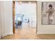 View through an archway showing dining and kitchen area at 125 Viola Dr, Auburndale, FL 33823